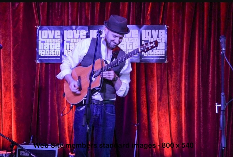 well dressed guitar player