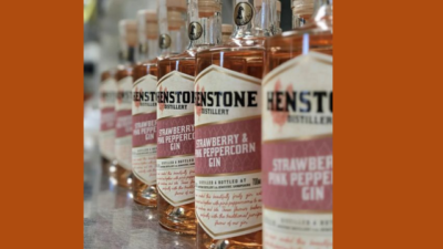 Bottlles of whiskey lined up on a shelf